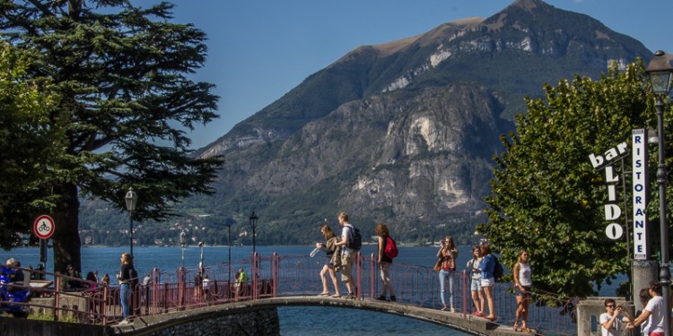 Visitors enter Varenna by walking down from the railroad track and crossing a stream on this bridge. Lake Como is in the background.