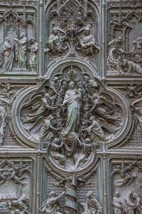In the center of the door is this beautiful carving of Mary, the mother of Jesus, holding her baby, surrounded by attending angels.