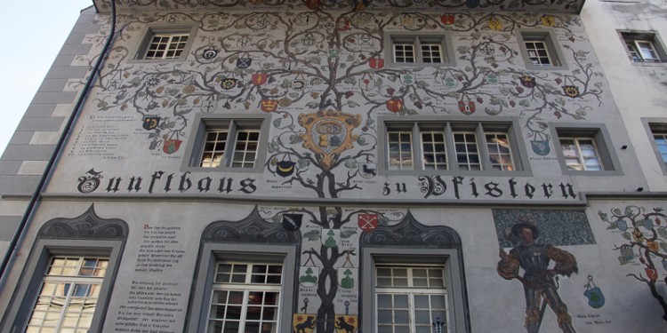 A restaurant building painted in the traditional German style. Lucerne is in the German section of Switzerland.
